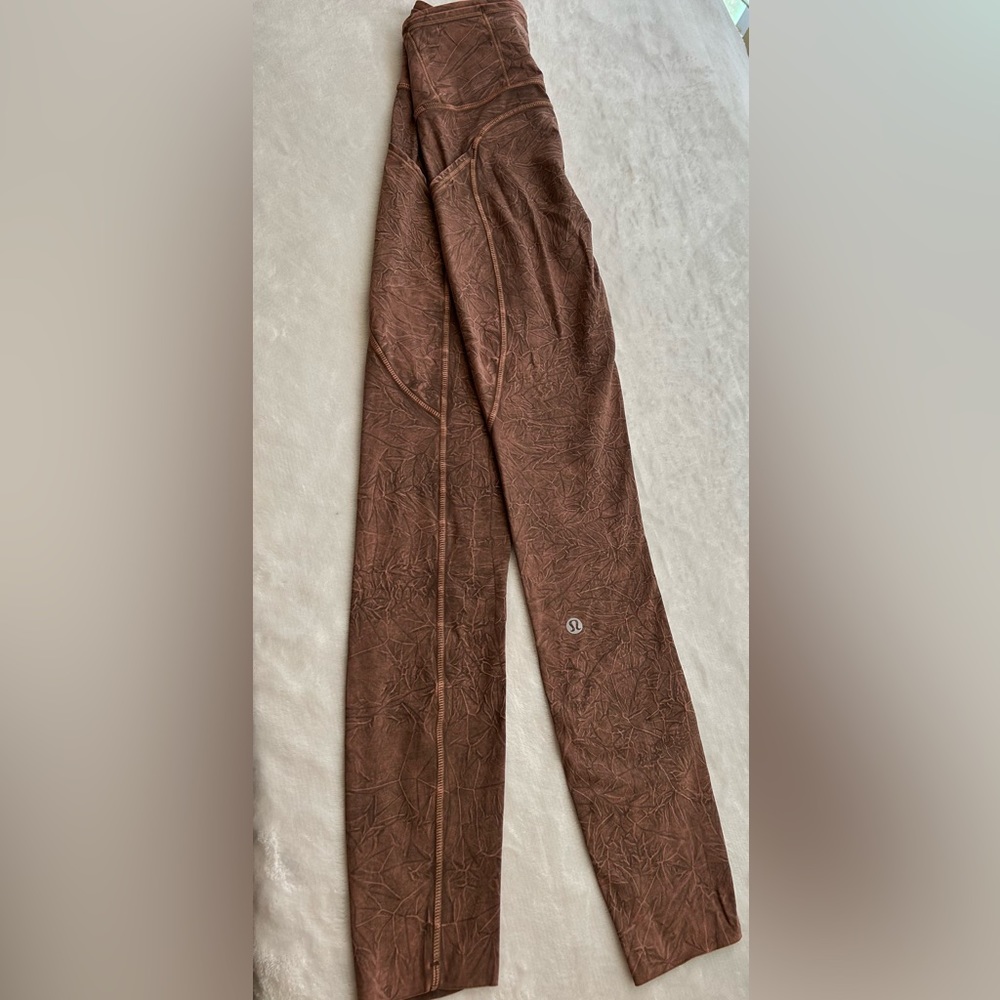 Fast And Free High Rise Leggings, lululemon- size 2-ice wash brown earth color.